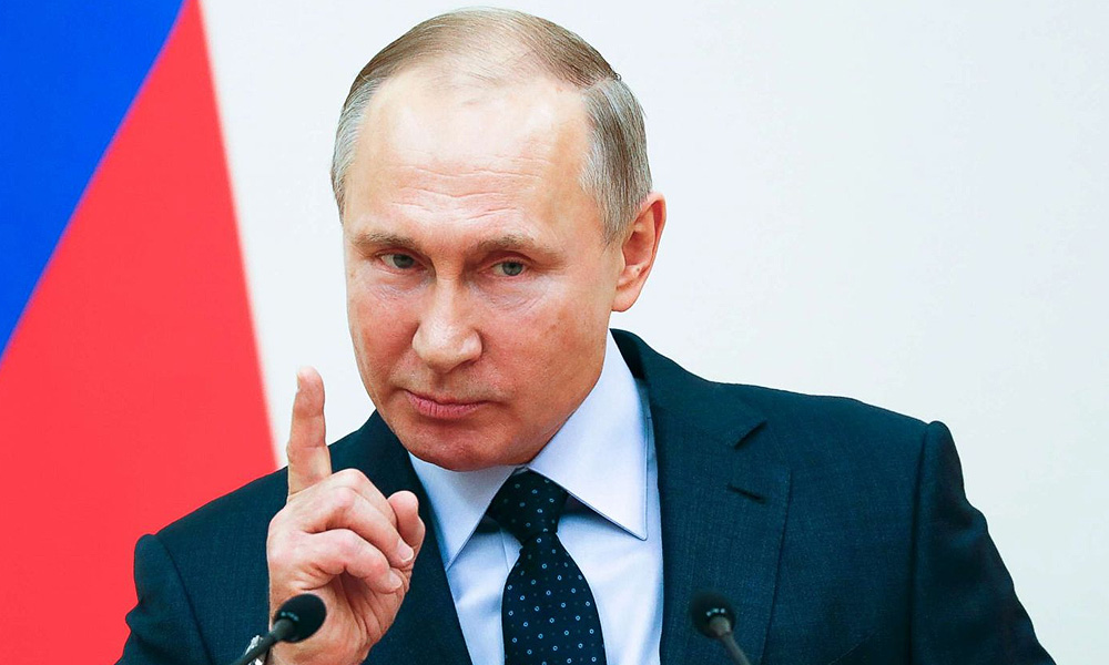 Putin signs law that could keep him in Kremlin until 2036