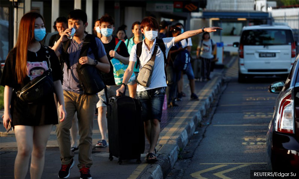 Covid-19: S'pore reports 14 imported cases, including one from M'sia