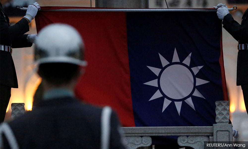 China tells Taiwan firms to choose sides