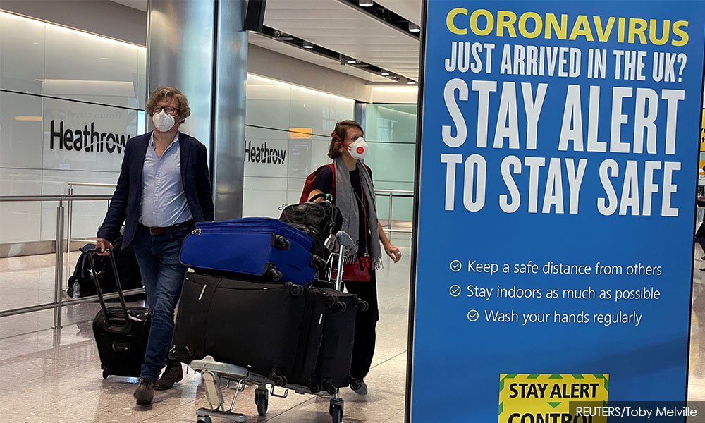Concerns over Omicron variant trigger more travel curbs, UK detects cases