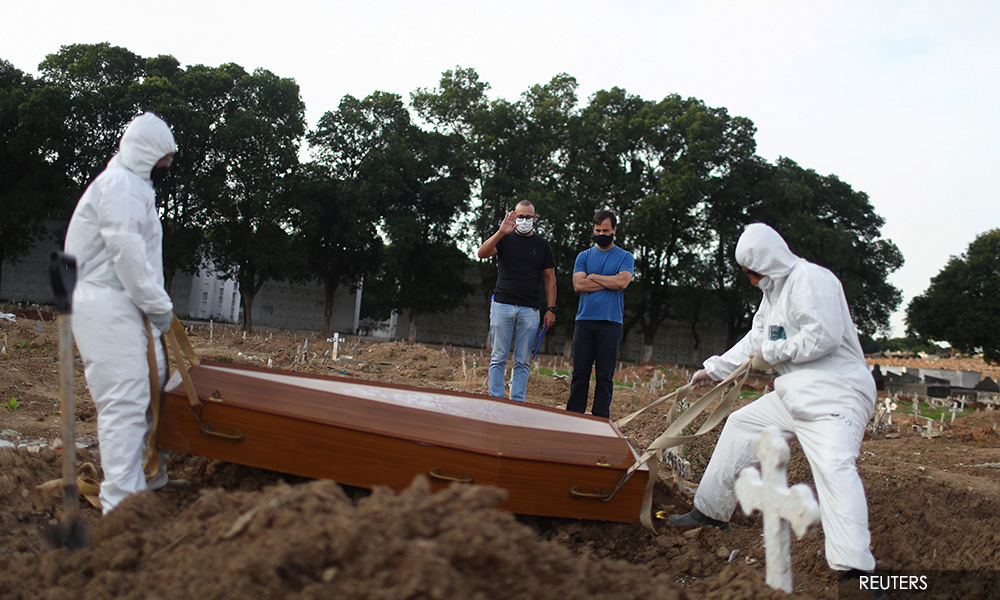 Brazil detects first case of South African variant, grave shortage looms