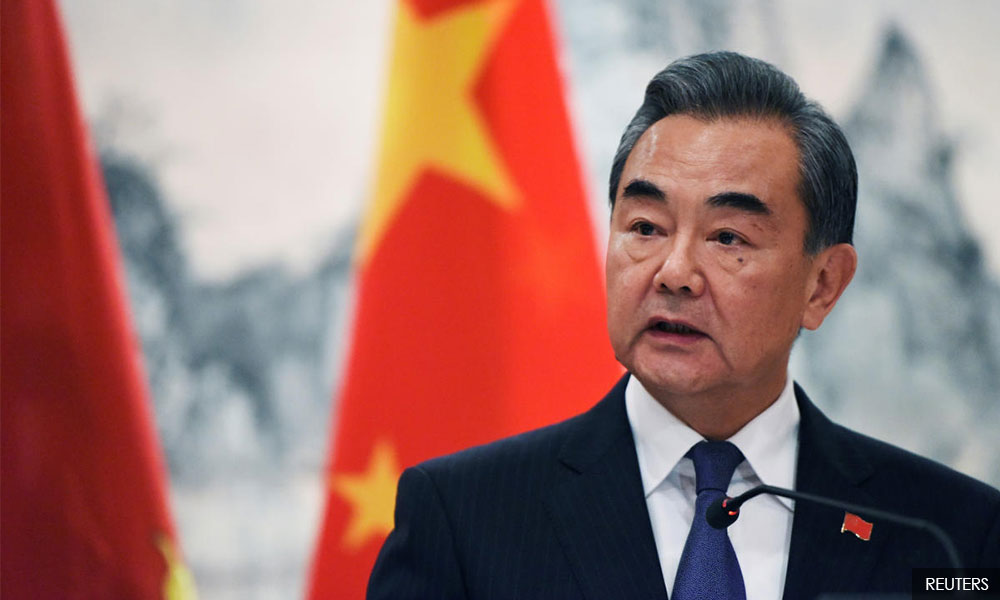 Chinese foreign minister tells top US diplomat world must 'positively guide' Taliban
