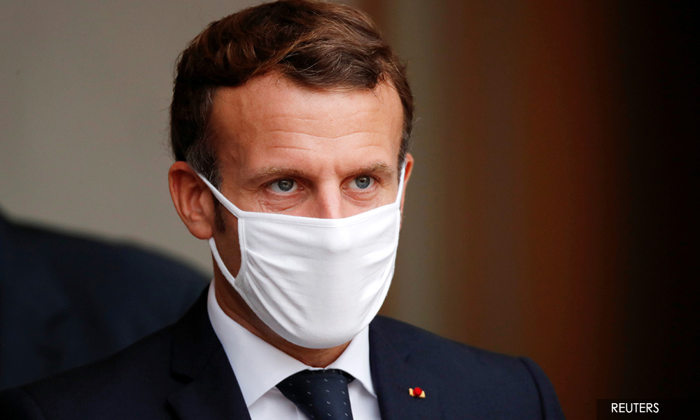 Macron defends decision not to order third lockdown as third wave spreads