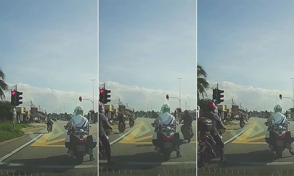 Red light video: Idle traffic cop goes viral but police claim it was a pursuit
