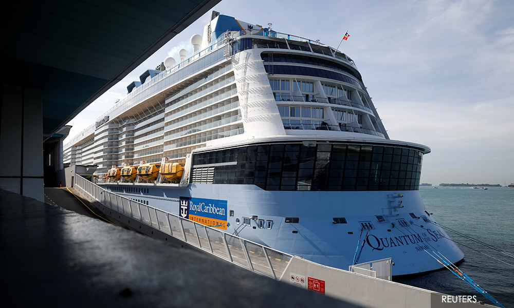 Singapore 'cruise-to-nowhere' turns back after Covid-19 case onboard