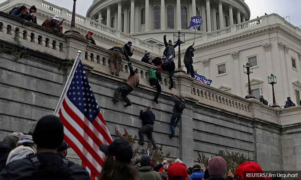 US charges four Proud Boys' leaders with conspiracy over deadly Capitol assault