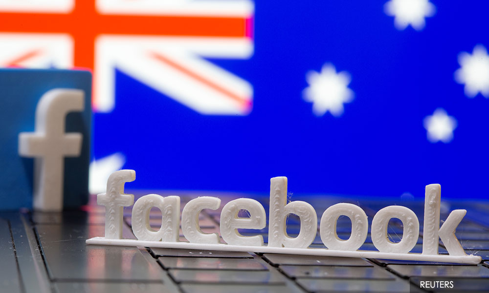 Facebook switches news back on in Australia, signs content deals
