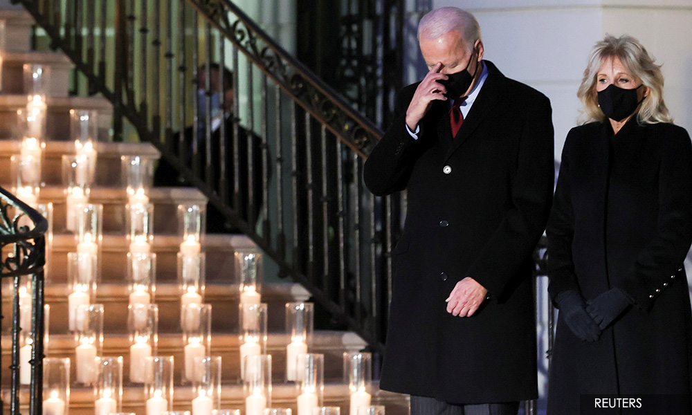 Bells toll for lives lost as US reaches 500,000 Covid deaths