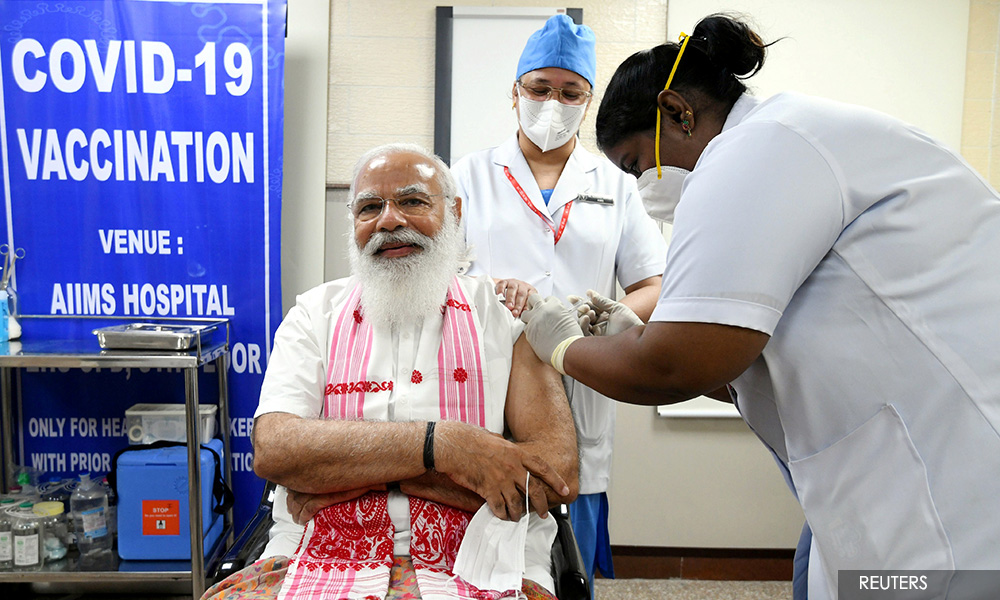 Modi takes home-grown vaccine as India widens immunisation drive