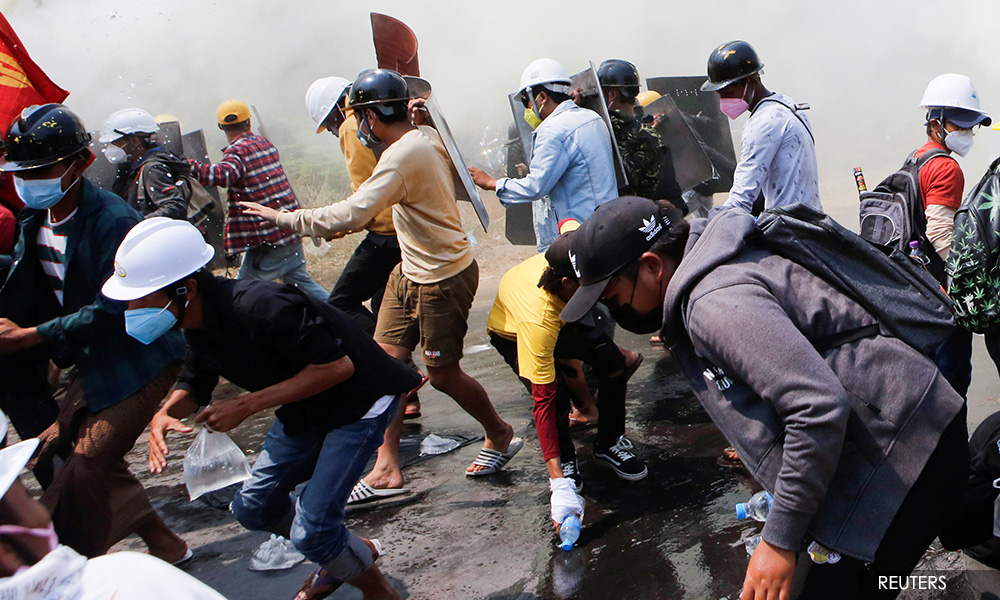 Myanmar forces trap and hunt protesters door to door