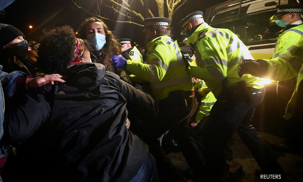 London police face backlash after dragging mourners from vigil for murdered woman
