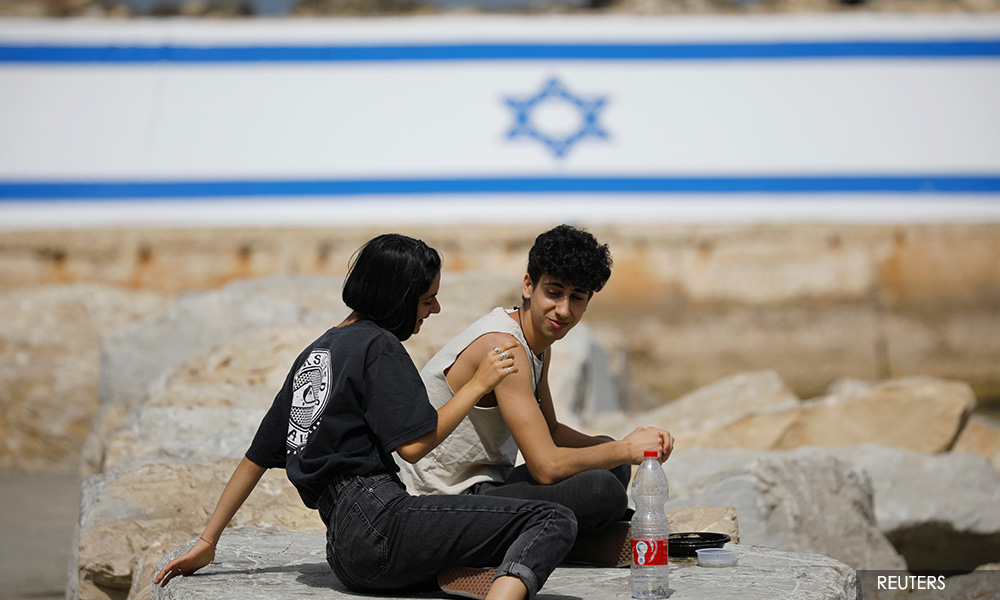 'A very good weird': Israel drops outdoor Covid mask order