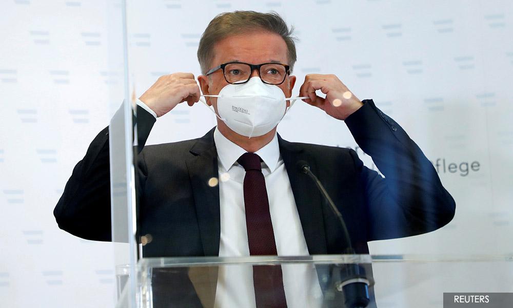 Austrian health minister says he is stepping down, exhausted