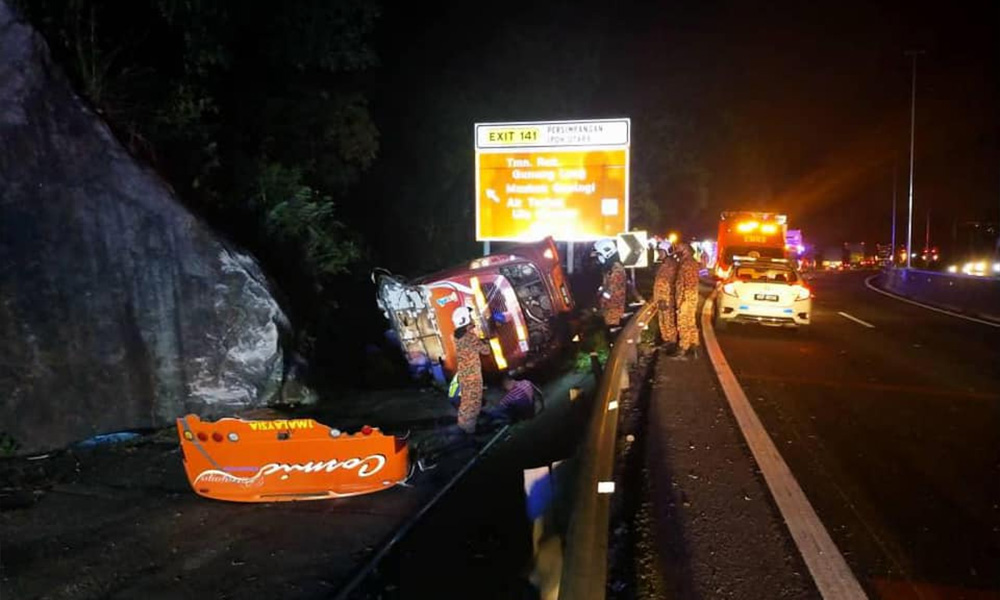 15 injured after express bus skids into drain on North-South Expressway