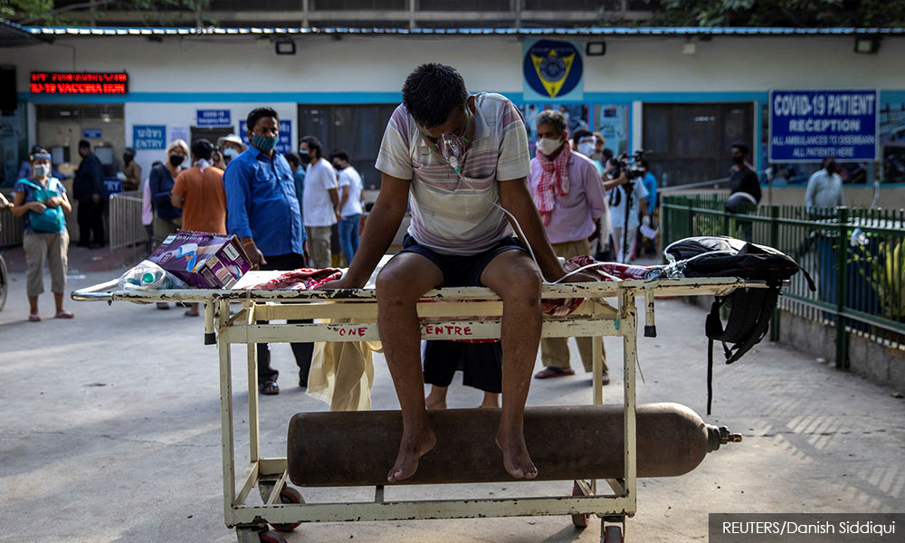 India's daily coronavirus cases climb to new world record as hospitals buckle