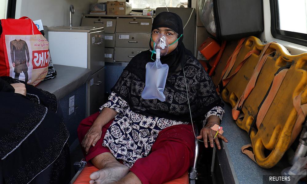 India's coronavirus crisis intensifies as nations pledge aid