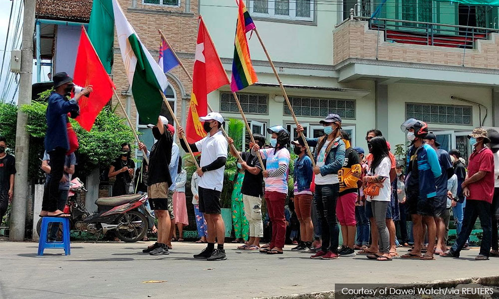 Myanmar protesters vow to 'shake the world', more mystery blasts reported