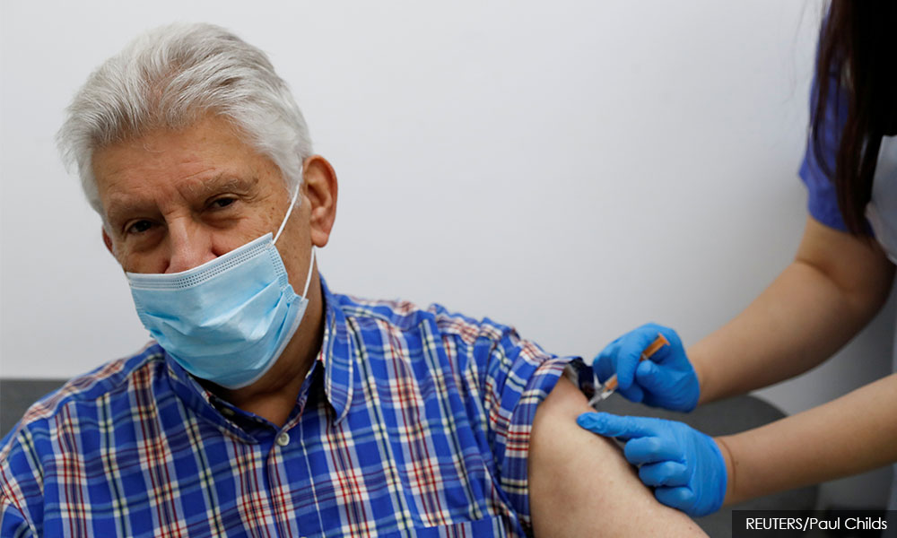 Over 50s to get booster shot, UK says Covid-19 vaccines saved over 100k lives
