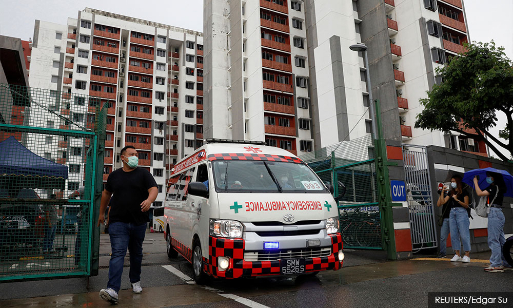 Singapore warns of 'tougher action' if infections spread wider