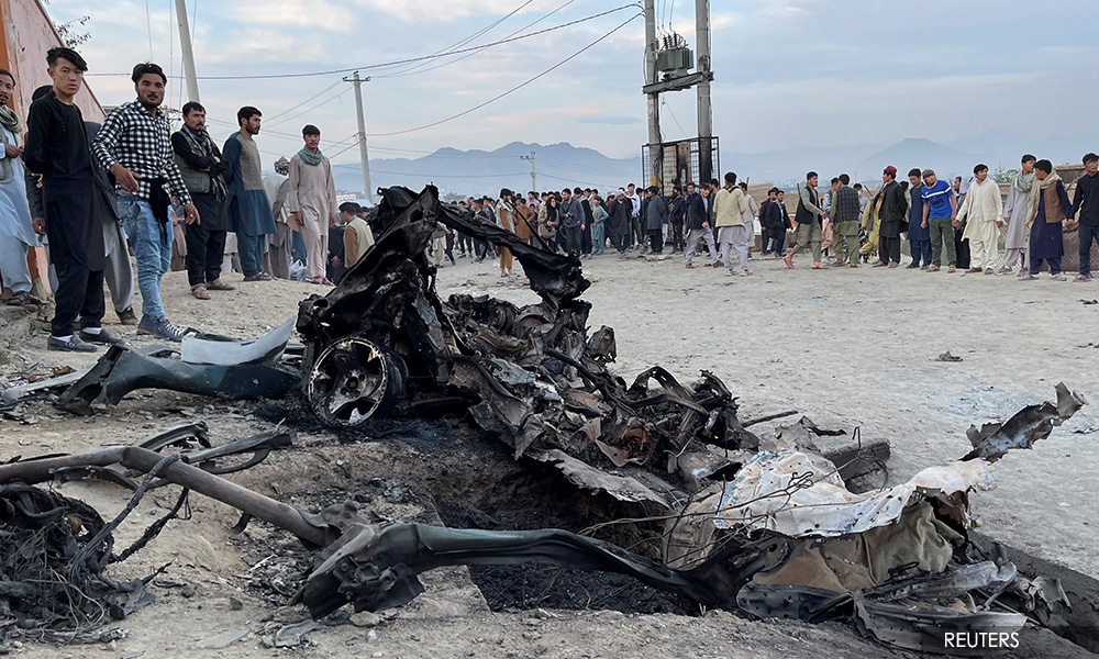 Afghan school blast kills 58, doctors struggle as families bury victims