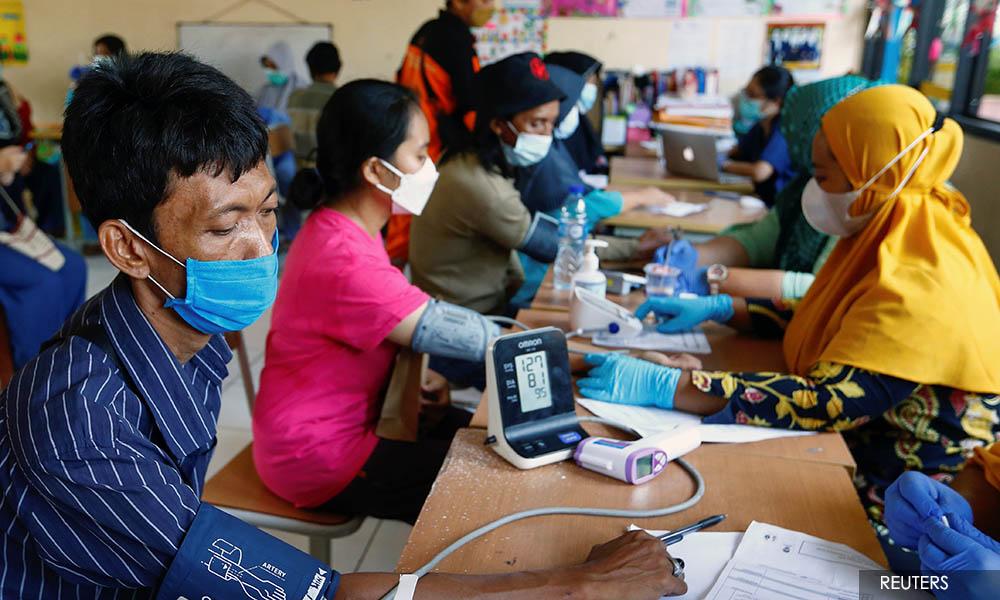 Hard-hit Indonesia warns Covid-19 cases to peak in July as hospitals fill