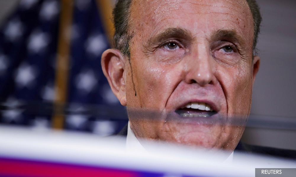 Ex-Trump lawyer Giuliani pressured Ukraine to probe Biden in 2019 - CNN