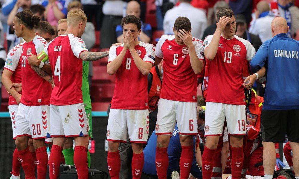 Danish player receives life-saving treatment on pitch during international match