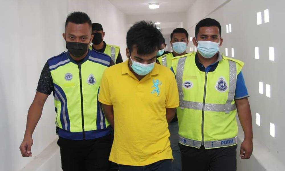 Petani muda didakwa miliki pistol, 11 butir peluru