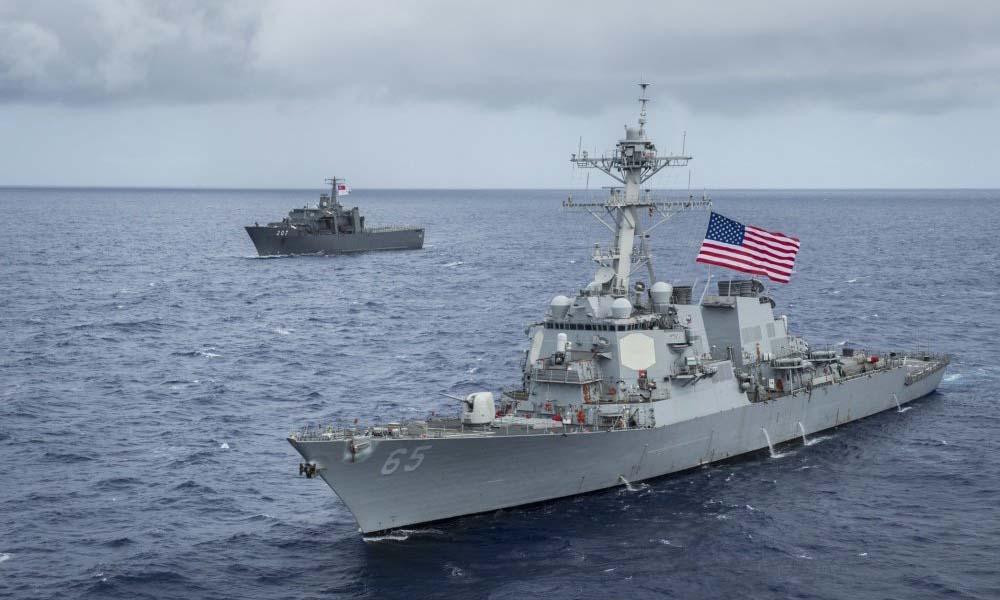 China 'drove away' US warship on tribunal ruling anniversary