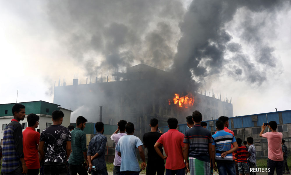 Fire at Bangladesh factory kills 52 workers, police open probe