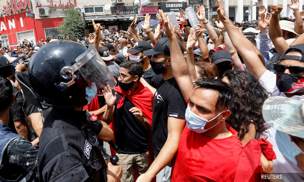 Tunisian president sacks prime minister, freezes Parliament