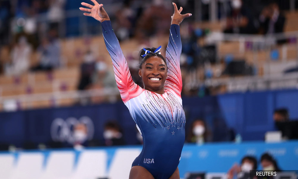 Olympics: Biles back with brave bronze as records fall, IOC probes Belarus