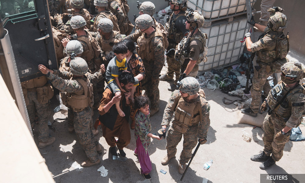 Biden expected to decide within 24 hours on Afghan evacuation deadline