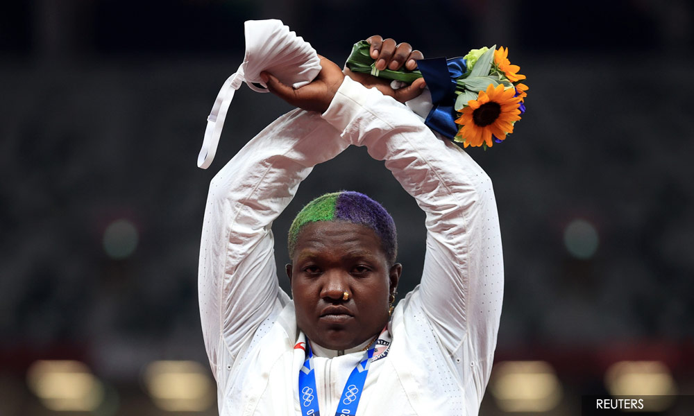 Olympics: IOC says looking into gesture used by US athlete Saunders on podium
