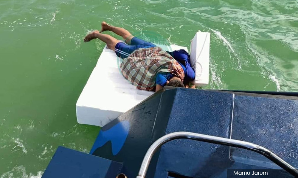 Man's 2nd swimming stunt leads to arrest for violating inter-district travel ban