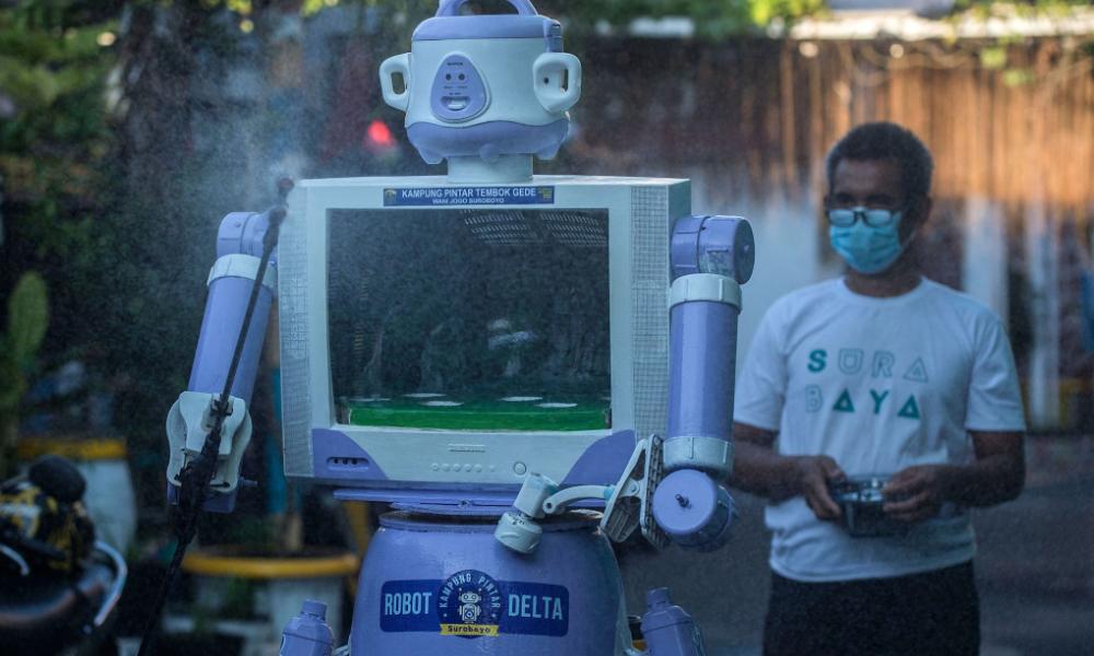 Malaysiakini - Indonesian village turns unwanted trash into Covid-19 robot helper