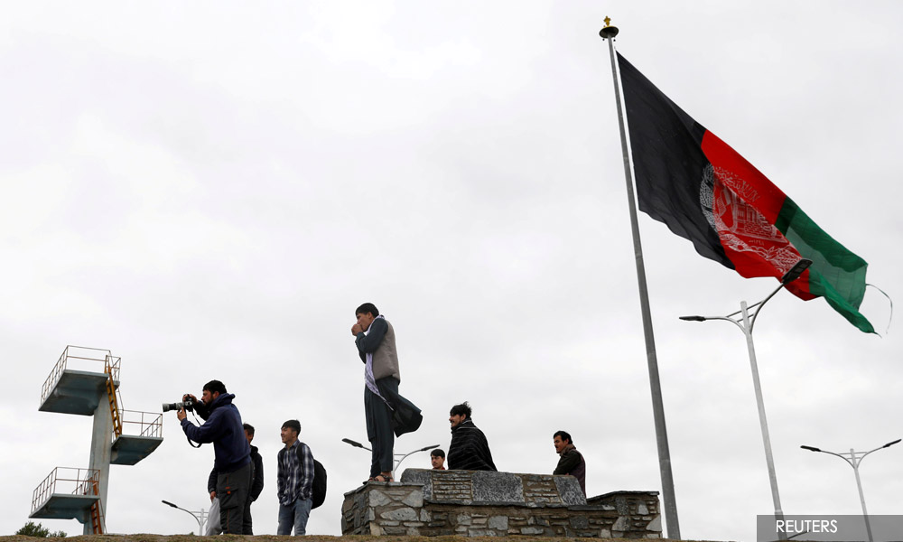 Taliban returns to power as president and diplomats flee Kabul