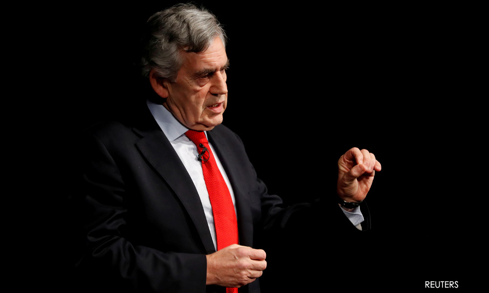 Ex-UK PM Brown accuses West of Covid vaccine stockpiling