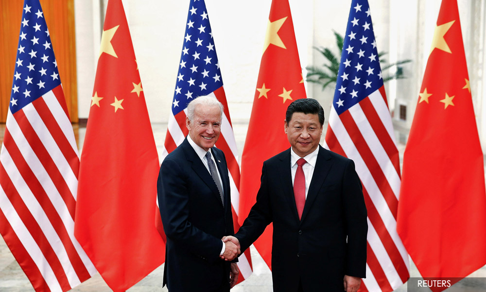 Biden says he and China's Xi agree to abide by Taiwan agreement