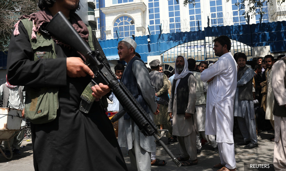 Afghan journalists beaten in Taliban detention, editor says