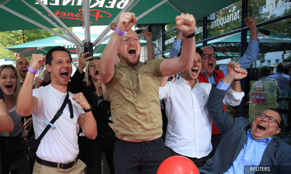 German Social Democrats beat conservatives in vote to decide Merkel successor