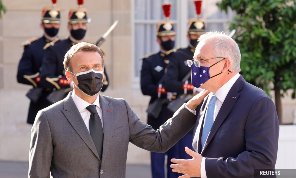Messages from Macron to Morrison leaked amid submarine deal row