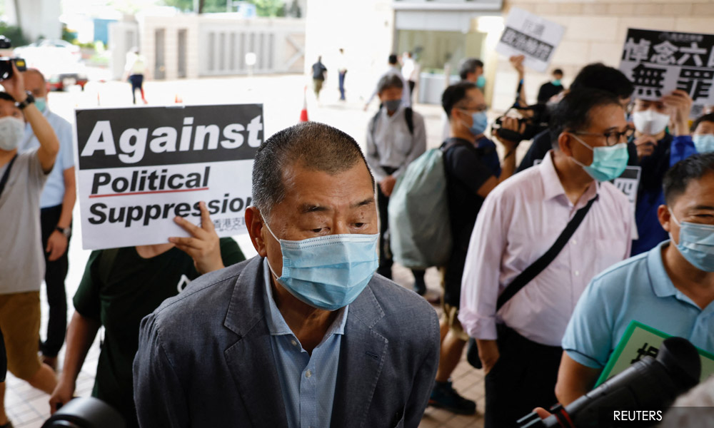 Hong Kong activists get up to 14 months in prison for banned Tiananmen vigil
