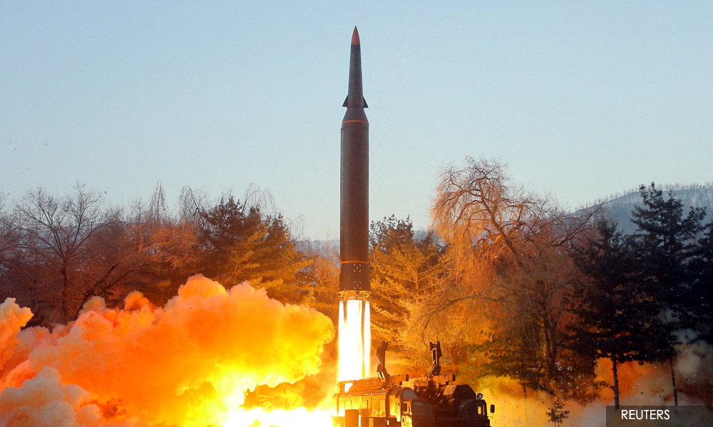 Biden imposes first sanctions over N Korea weapons programme after missile tests