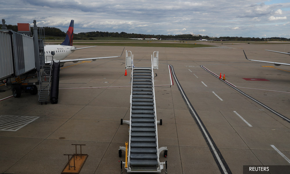 China orders suspension of some US flights after Covid-19 cases