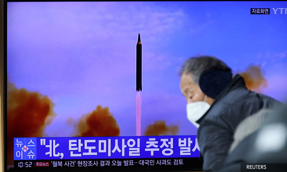 N. Korea fires missile, warns of strong action over US sanctions push