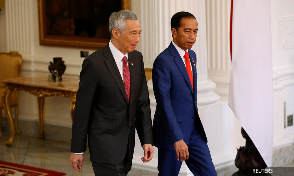 Indonesia, S'pore sign extradition, airspace and defence agreements