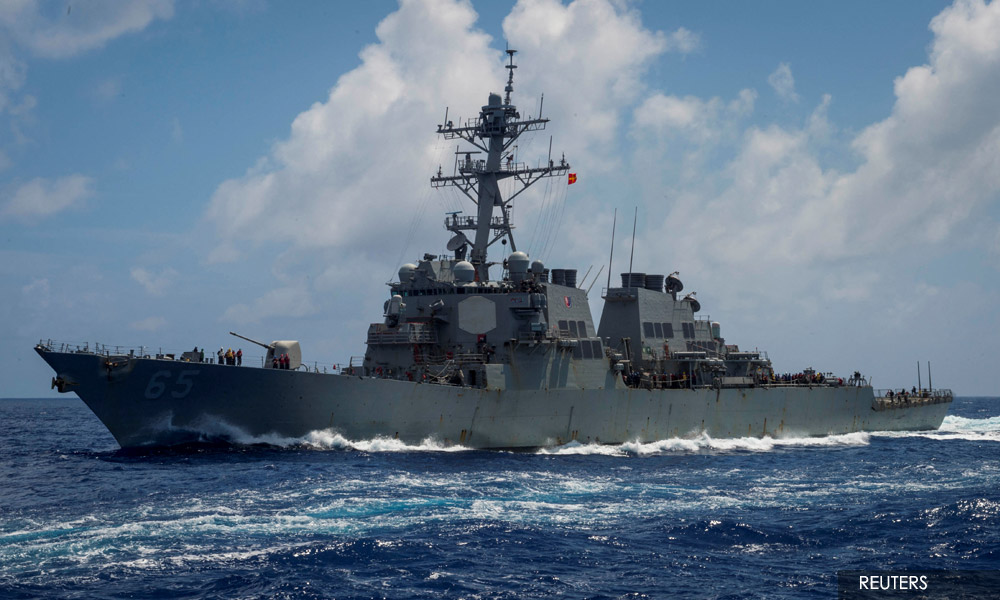 China says it warned away US warship in South China Sea