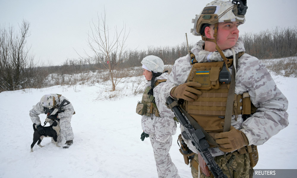 Biden warns Putin with sanctions as West steps up Ukraine defences