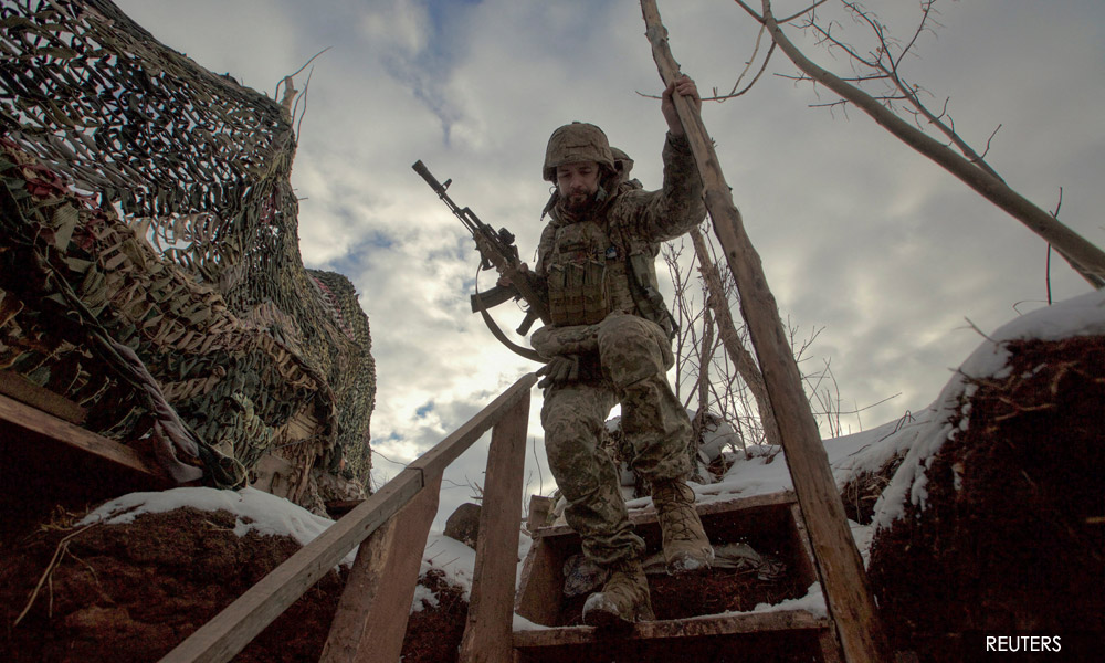 UK warns Russia will face severe sanctions if it puts 'puppet regime' in Ukraine